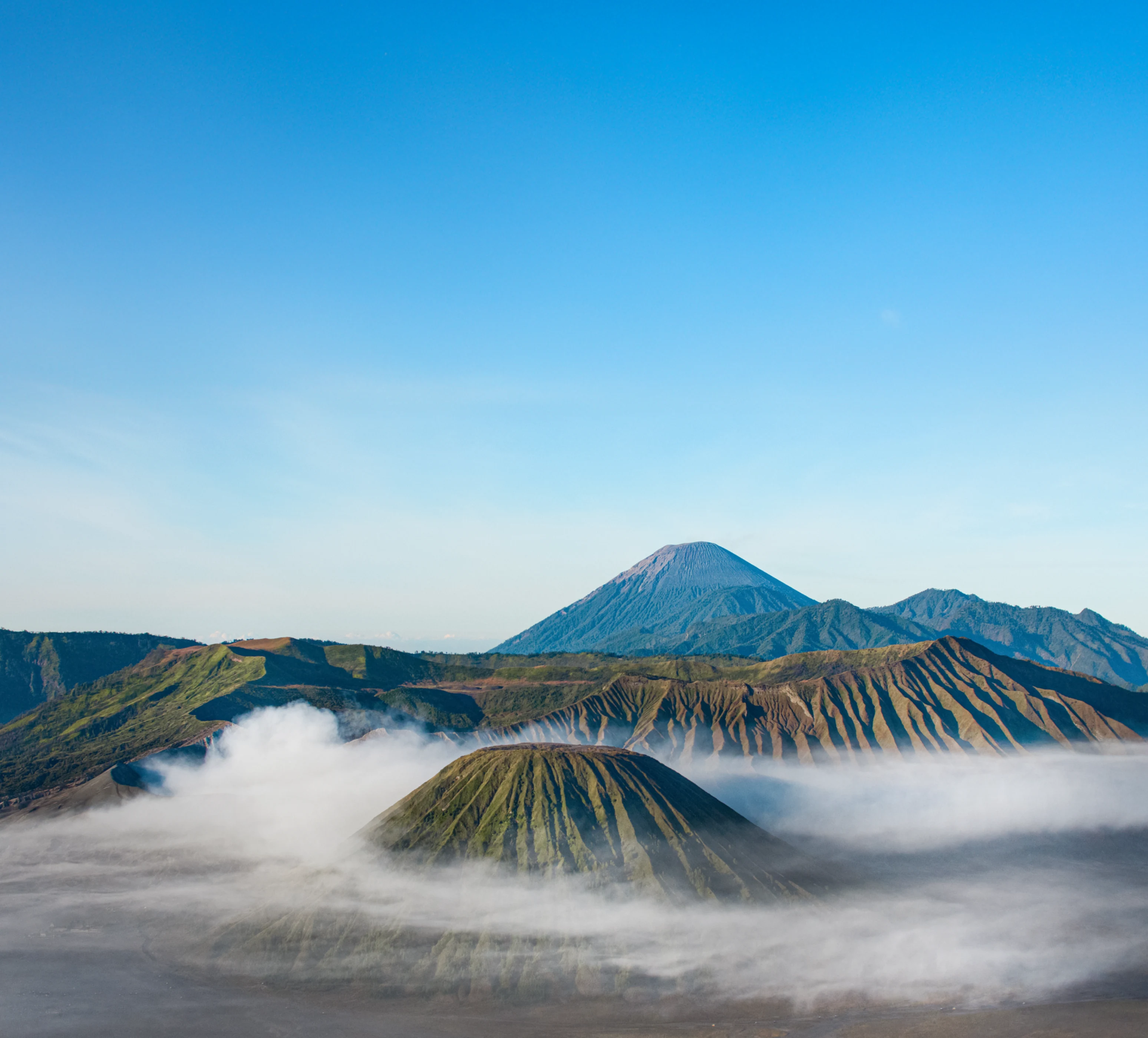 Mount Bromo above a sea of clouds